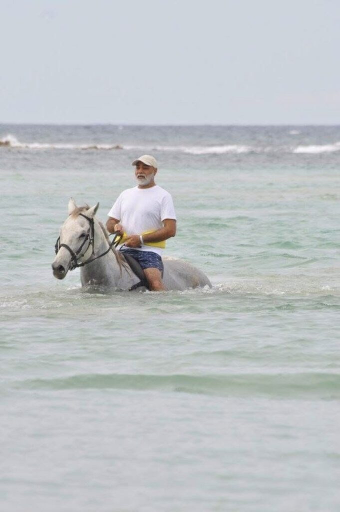 Man Horse Riding in Water